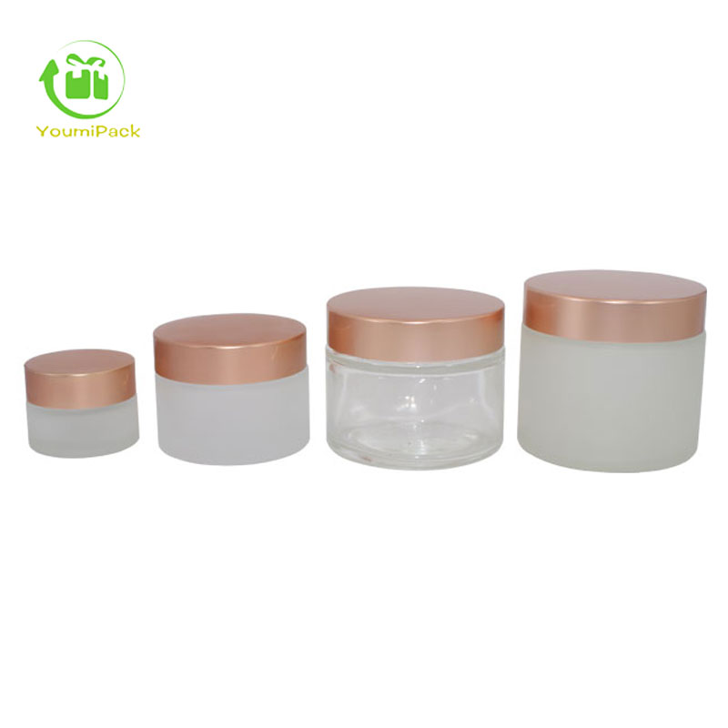 white frosted glass jar with rose gold lid