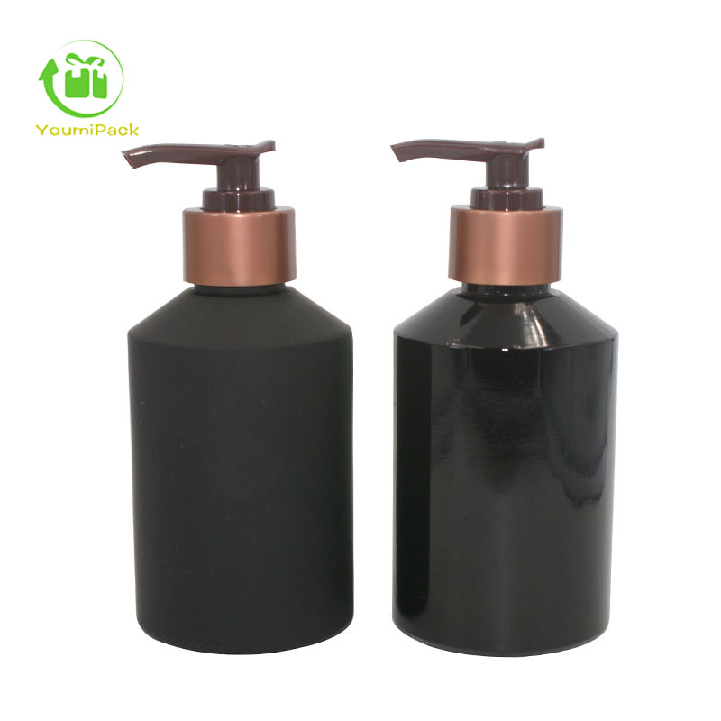 black glass bottles with rose bronze pump
