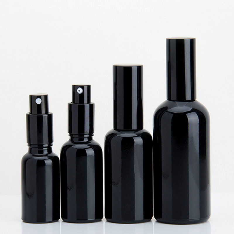 Dark violet glass cosmetic bottle with pump