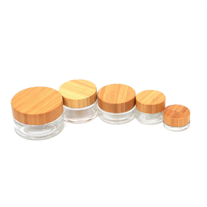 5g,15g,30g,50g,100g glass clear jar with bamboo cap title=